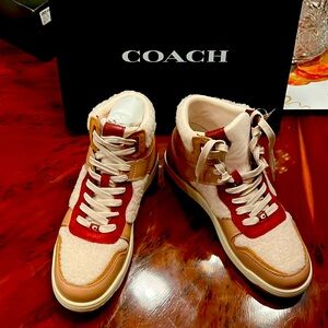 Coach /Cherry/Light high top sherpa.Size 9.5 sneaker..  New in Box. Never worn.